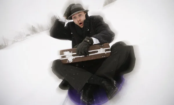 Businessman On A Sled — Stock Photo, Image