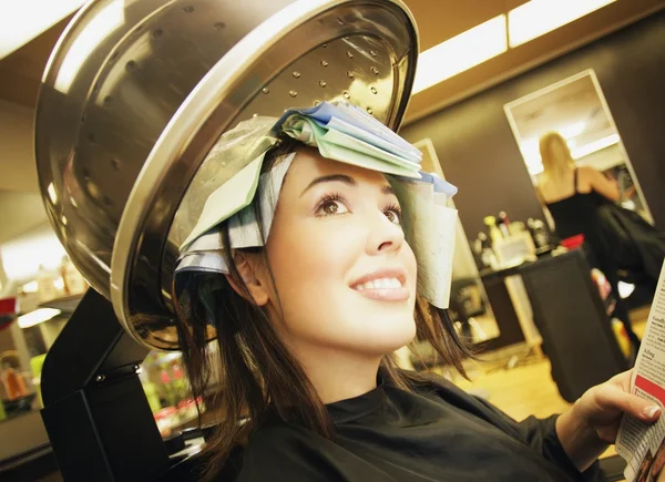 A Young Woman In A Hair Salon A Young Woman In A Hair-Salon A Young Woman In A Hair Salon Stock Picture