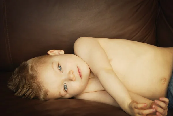 Young Boy Lying Down — Stock Photo, Image