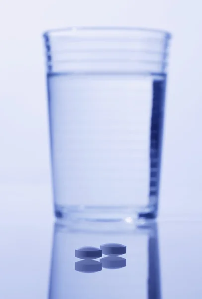 Closeup Of Pills With Water — Stock Photo, Image