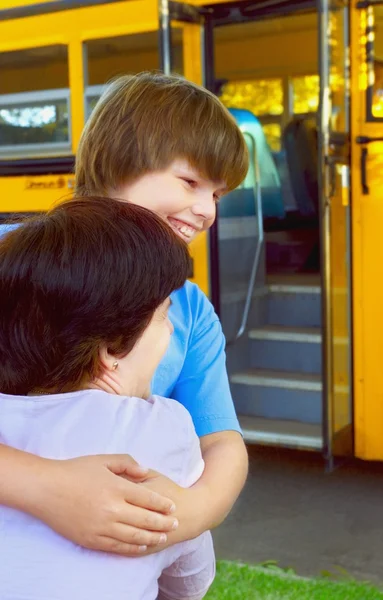 Child Hugs Mother Good-Bye — Stock Photo, Image