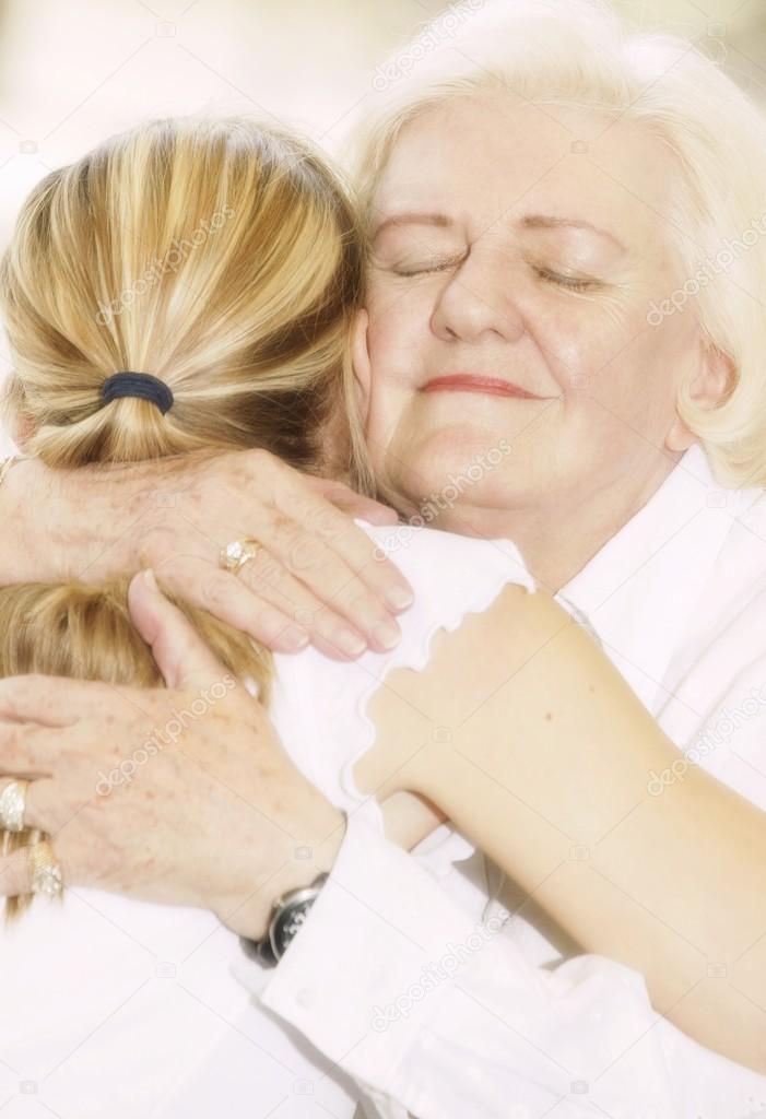 Grandma Hugging Granddaughter