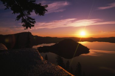 Sunrise Over Wizard Island At Crater Lake National Park clipart