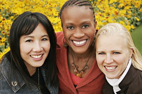 Multiethnic Portrait Of Three Women Outdoors