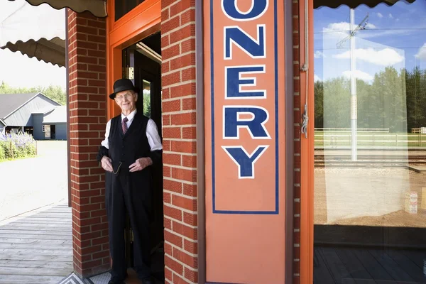 Older Man Outside Business — Stock Photo, Image