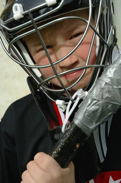 Joven jugador de hockey —  Fotos de Stock