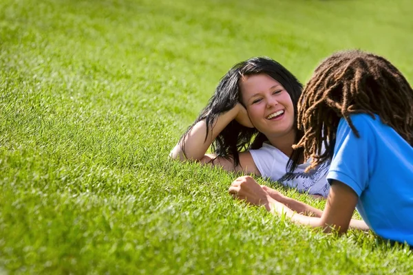 Couple Laying On The Grass — Stock Photo, Image
