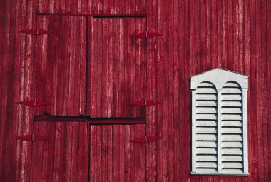 Red Barn Door And White Louvered Window clipart