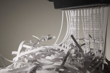 Closeup Of A Paper Shredder clipart