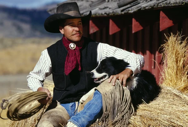 Cowboy avec son chien — Photo