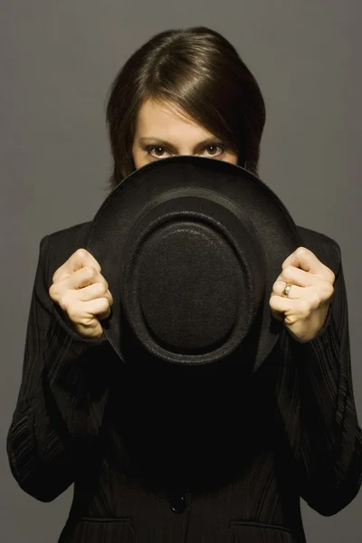 Young Woman Holding Top Hat — Stock Photo, Image