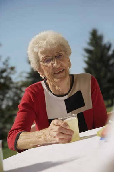 Senior Woman With Juice — Stock Photo, Image