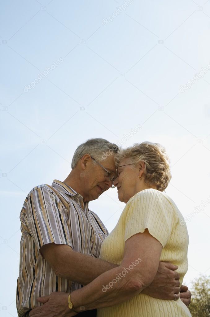 Elderly Couple Embracing