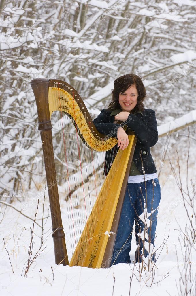Harpist In The Snow