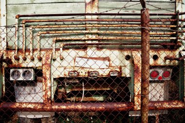 Old Rusty Truck Behind Fence clipart