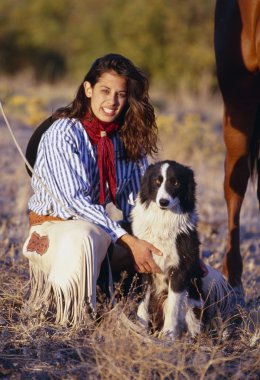 Cowgirl With Her Dog clipart