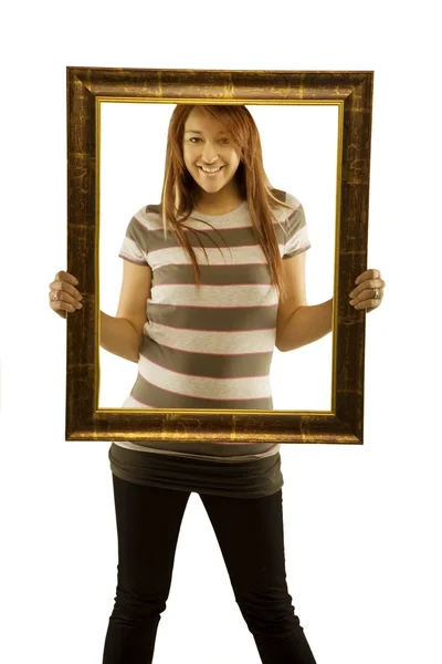 Mujer posando con marco de imagen — Foto de Stock
