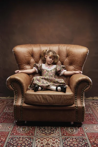 Girl Sitting In Large Armchair — Stock Photo, Image