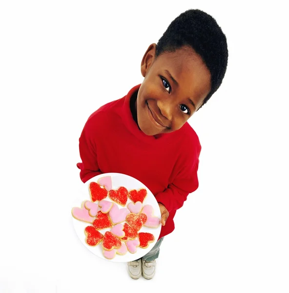 Boy Holding Plate Of Heart Cookies — Stock Photo, Image