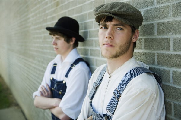 Two Young Men In Old-Fashioned Garments