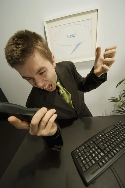 Businessman Screaming Into A Phone — Stock Photo, Image