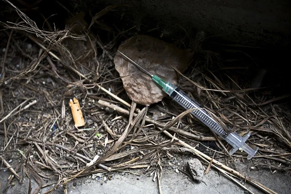 Syringe And Needle On Street Stock Image