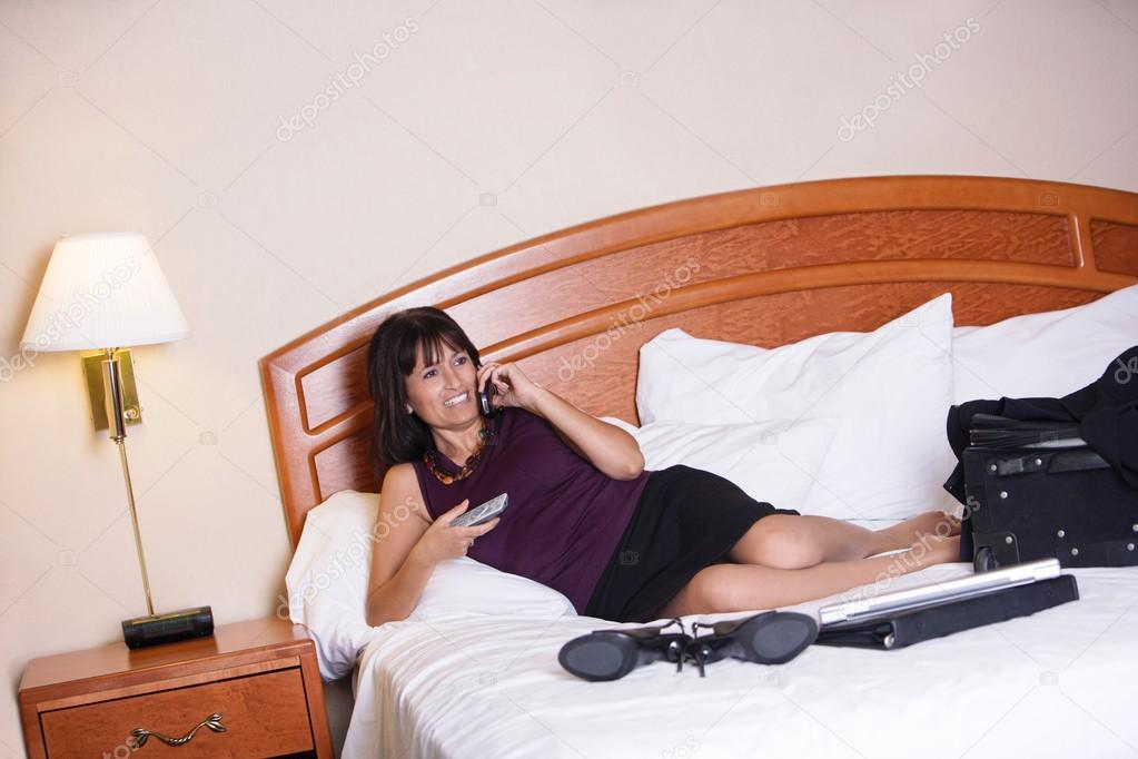Woman In A Hotel Room
