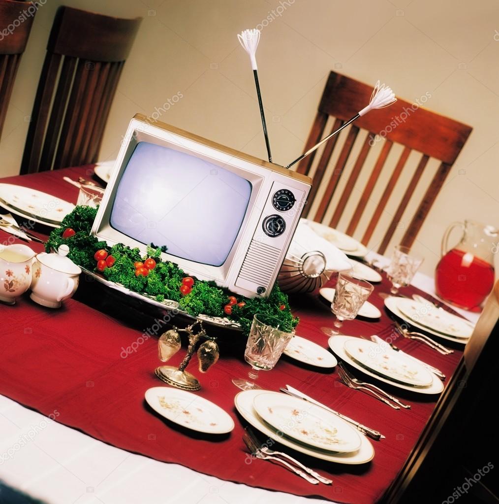 Tv On Platter On Dinner Table