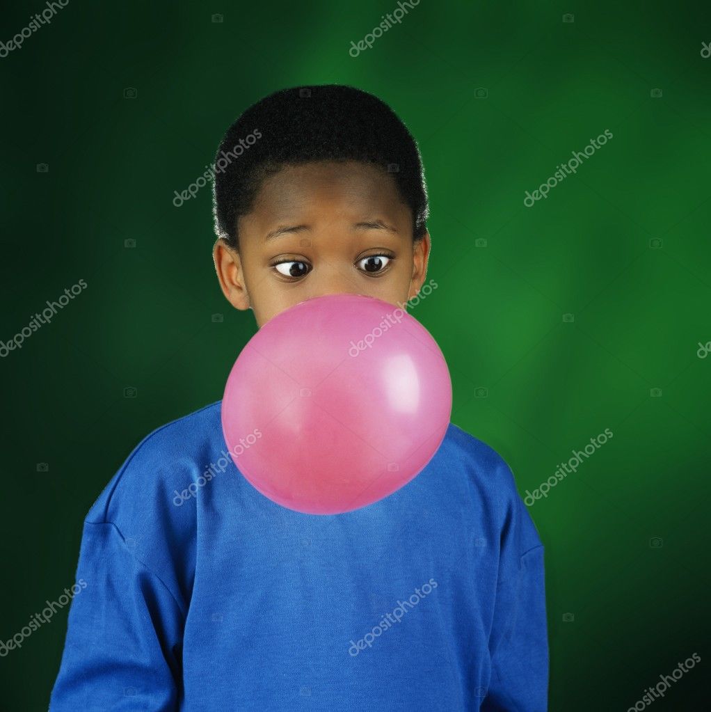 Boy Blowing Huge Bubble With Bubble Gum Stock Photo by ©DesignPicsInc ...