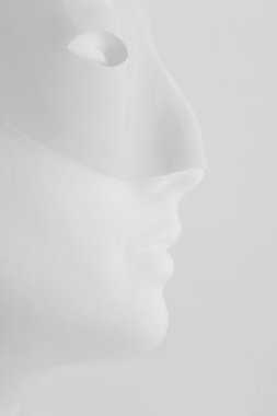 Profile View Of Mannequin With Mask clipart