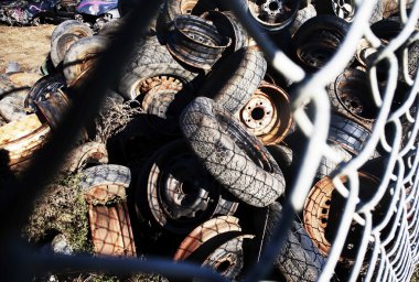 Tires In A Scrap Yard clipart