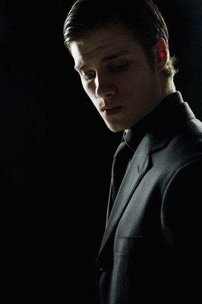 Man on dark background