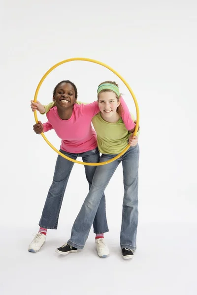 Girls Holding Yellow Hula Hoop — Stock Photo, Image
