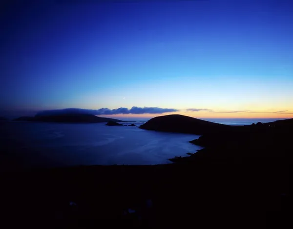 Solnedgång, dunmore head, blasket islands, Irland — Stockfoto