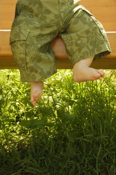Lille barns fødder - Stock-foto