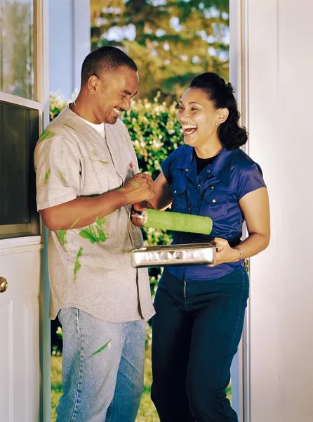 Couple Laughing Over Spilled Paint — Stock Photo, Image