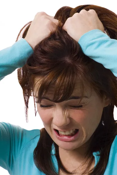 Kvinna anläggning huvud i ångest — Stockfoto
