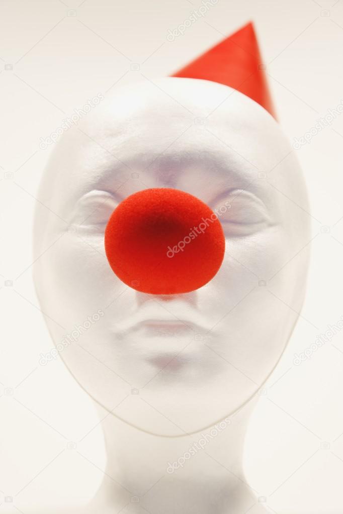 Mannequin Wearing A Party Hat And Clown Nose
