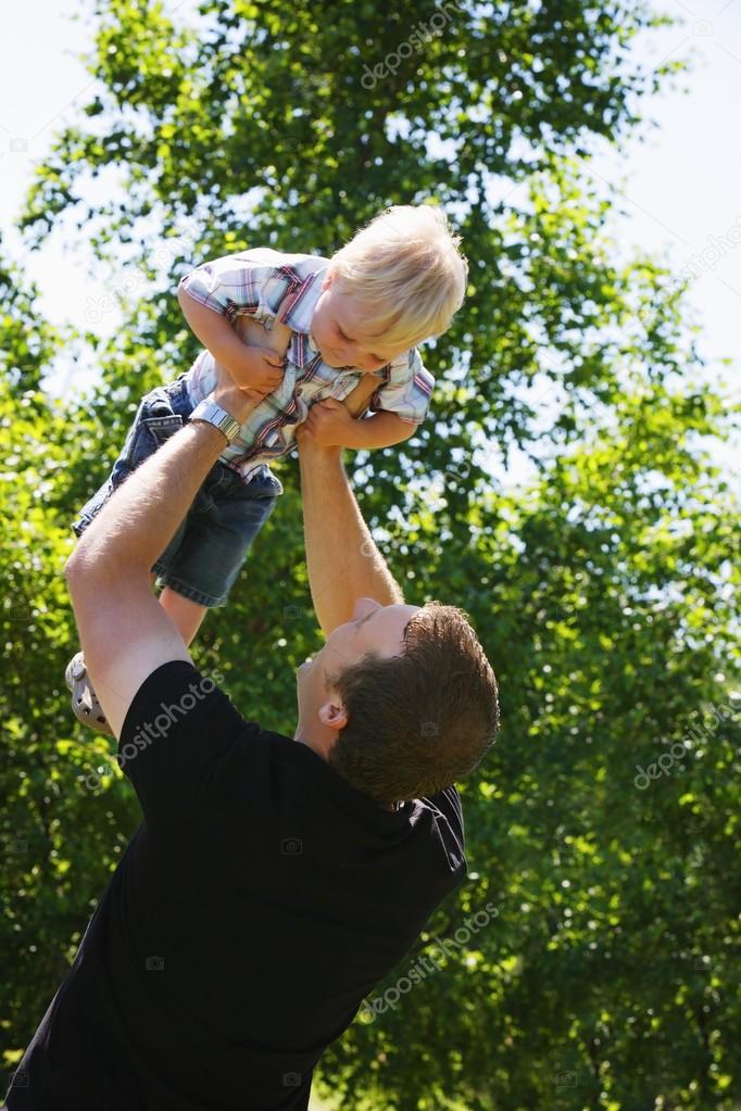 Man Holding Child