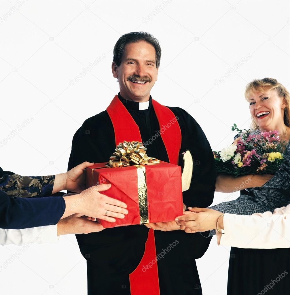 Priest Receiving Gifts