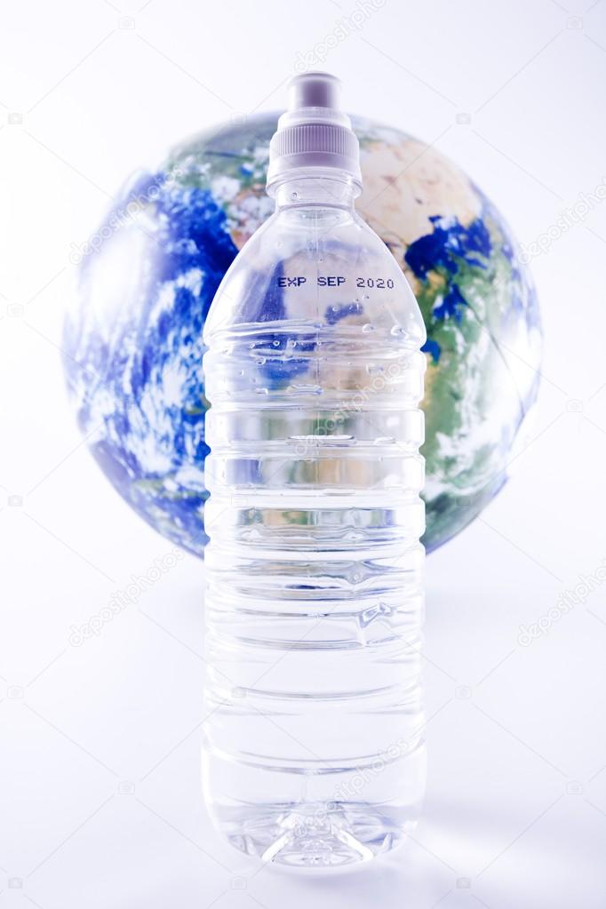 Bottle In Front Of Earth