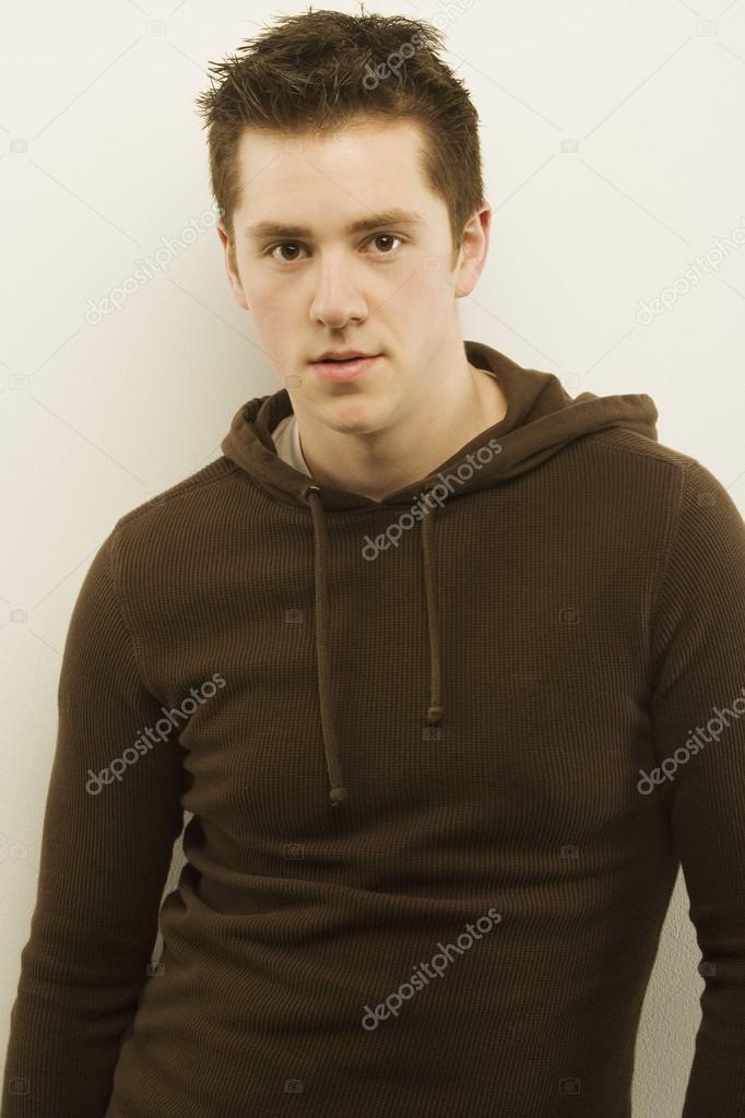 Young Man Wearing Brown Hooded Sweater