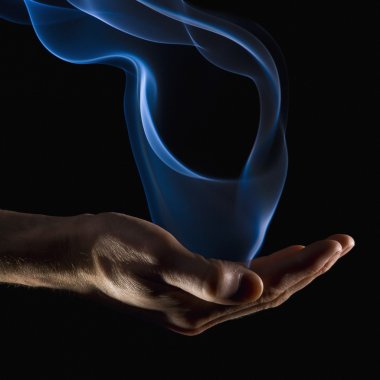 Smoke Wisps From A Hand clipart