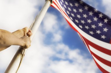 Raising An American Flag clipart
