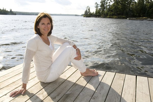 Woman relaxing on dock