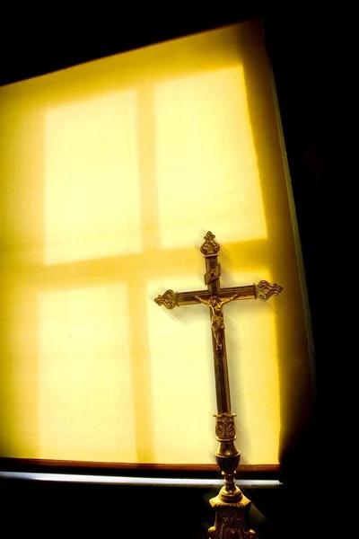 Crucifix Next To A Window — Stock Photo, Image