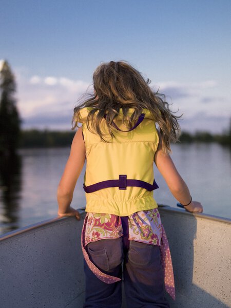 Girl In The Front Of A Boat