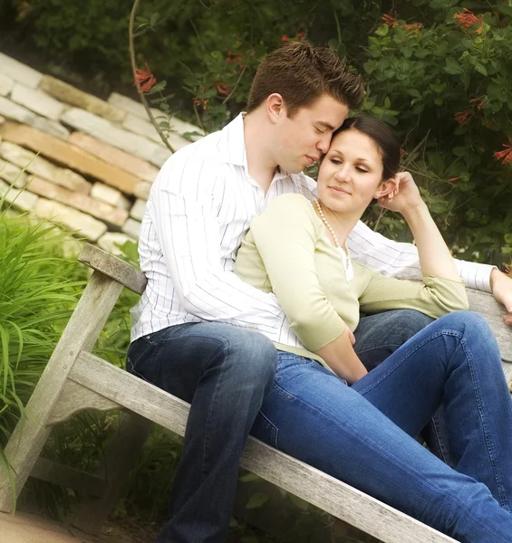 Couple Sitting On A Bench — Stock Photo, Image