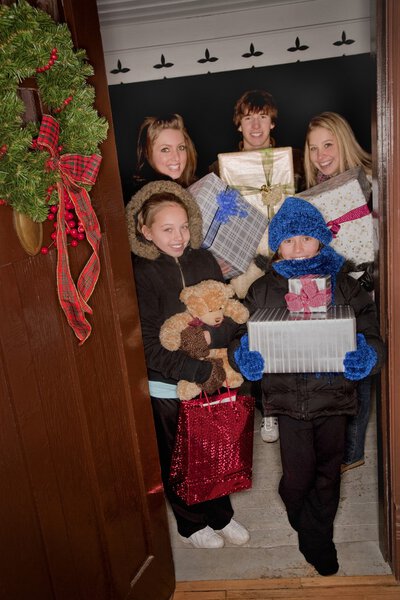 Kids Delivering Christmas Gifts