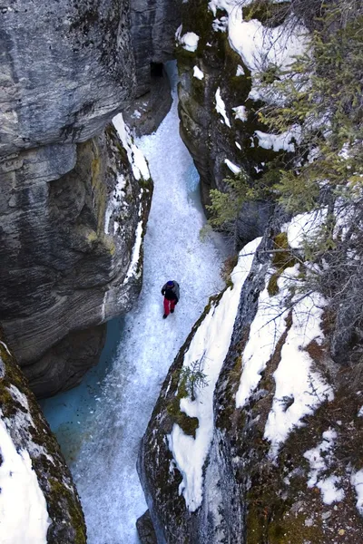 Person Walking In Maligne Canyon In The Winter, Alberta, Canada — Stock Image Person Walking In Maligne Canyon In The Winter, Alberta, Canada Stock Photo